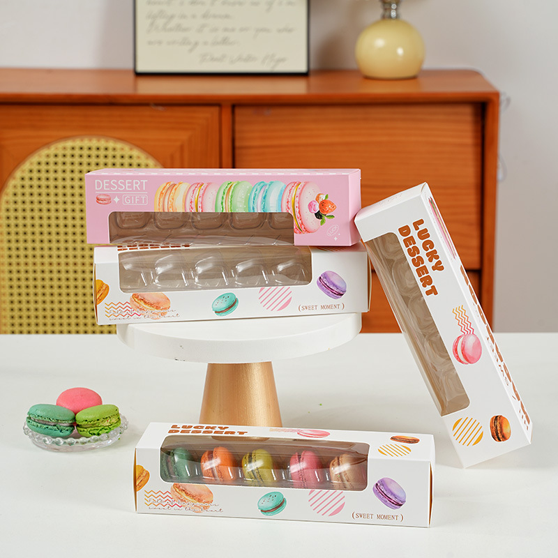 drawer-style packaging box designed specifically for macarons (French almond cookies). The packaging is crafted to highlight the vibrant colors and delicate appearance of the macarons, making it ideal for gifting or retail display.